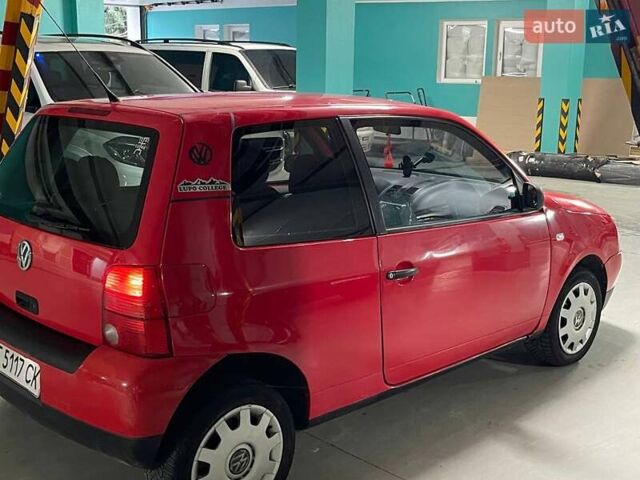 Красный Фольксваген Лупо, объемом двигателя 1 л и пробегом 313 тыс. км за 2400 $, фото 4 на Automoto.ua