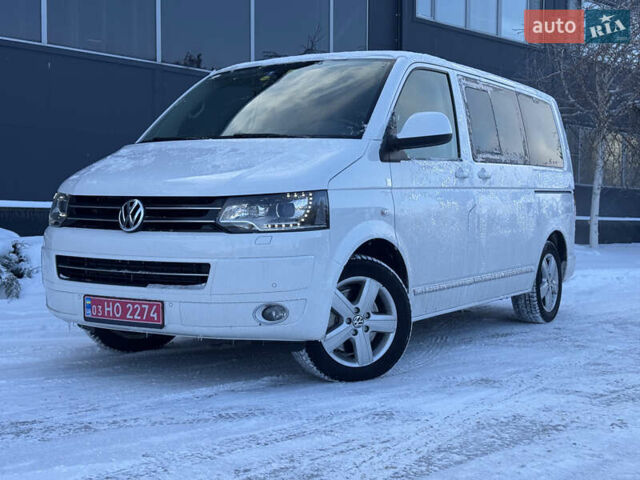 Белый Фольксваген Мультиван, объемом двигателя 2 л и пробегом 221 тыс. км за 26500 $, фото 1 на Automoto.ua