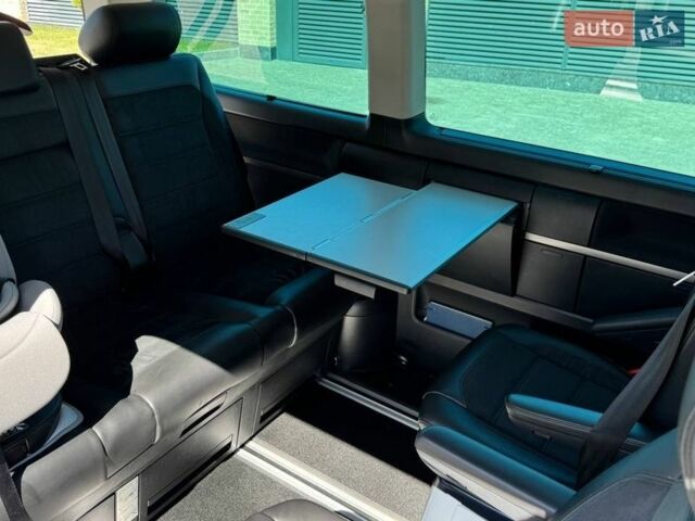 Білий Фольксваген Мультиван, об'ємом двигуна 1.97 л та пробігом 359 тис. км за 28000 $, фото 32 на Automoto.ua