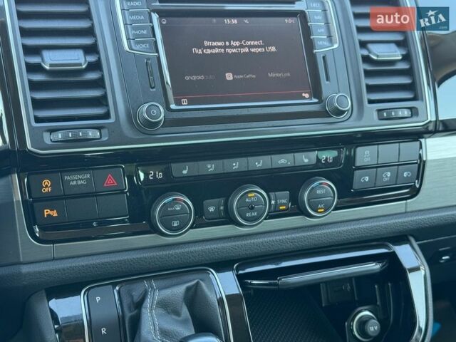 Белый Фольксваген Мультиван, объемом двигателя 2 л и пробегом 195 тыс. км за 39900 $, фото 24 на Automoto.ua