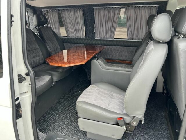 Білий Фольксваген Мультиван, об'ємом двигуна 2 л та пробігом 77 тис. км за 28500 $, фото 7 на Automoto.ua