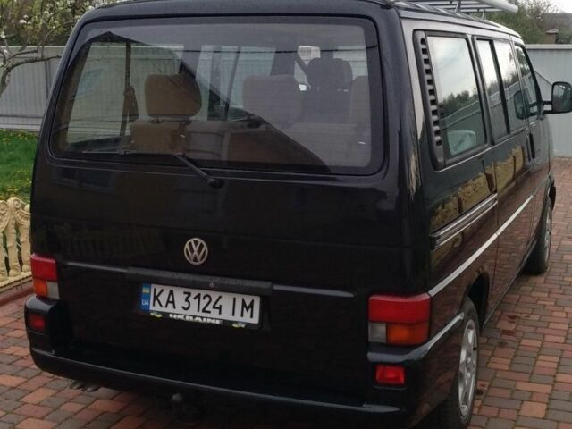 Черный Фольксваген Мультиван, объемом двигателя 2.5 л и пробегом 333 тыс. км за 11500 $, фото 2 на Automoto.ua