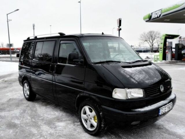 Черный Фольксваген Мультиван, объемом двигателя 2.5 л и пробегом 296 тыс. км за 2100 $, фото 1 на Automoto.ua