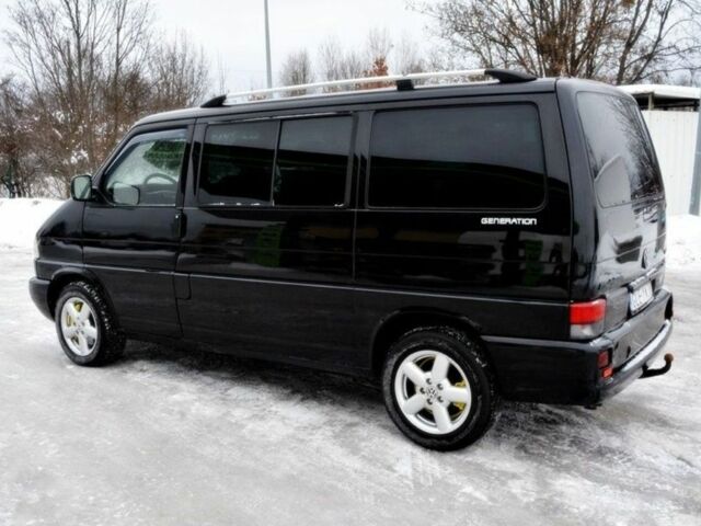 Черный Фольксваген Мультиван, объемом двигателя 2.5 л и пробегом 296 тыс. км за 2100 $, фото 2 на Automoto.ua