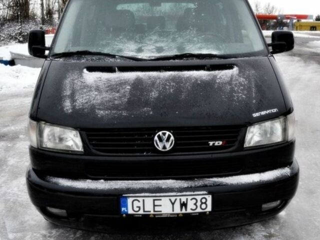 Черный Фольксваген Мультиван, объемом двигателя 2.5 л и пробегом 296 тыс. км за 2100 $, фото 5 на Automoto.ua