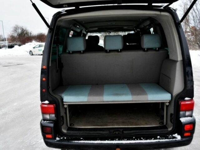 Черный Фольксваген Мультиван, объемом двигателя 2.5 л и пробегом 296 тыс. км за 2100 $, фото 4 на Automoto.ua