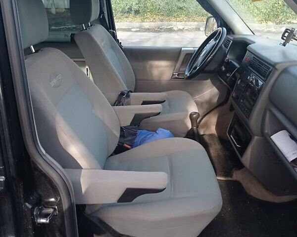 Чорний Фольксваген Мультиван, об'ємом двигуна 2.46 л та пробігом 488 тис. км за 12000 $, фото 5 на Automoto.ua