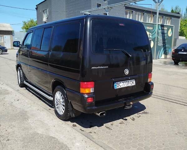 Чорний Фольксваген Мультиван, об'ємом двигуна 2.46 л та пробігом 488 тис. км за 12000 $, фото 4 на Automoto.ua