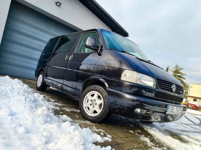 Черный Фольксваген Мультиван, объемом двигателя 2.5 л и пробегом 305 тыс. км за 3500 $, фото 2 на Automoto.ua