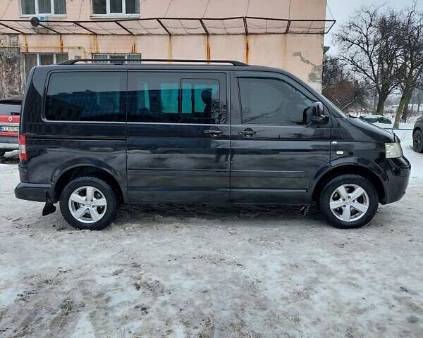 Черный Фольксваген Мультиван, объемом двигателя 2.5 л и пробегом 309 тыс. км за 10000 $, фото 9 на Automoto.ua