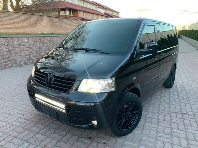 Чорний Фольксваген Мультиван, об'ємом двигуна 2.5 л та пробігом 319 тис. км за 11999 $, фото 1 на Automoto.ua