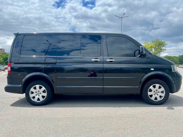 Чорний Фольксваген Мультиван, об'ємом двигуна 2.5 л та пробігом 310 тис. км за 13000 $, фото 1 на Automoto.ua