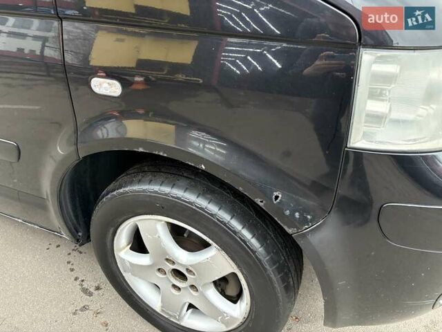 Черный Фольксваген Мультиван, объемом двигателя 3.2 л и пробегом 305 тыс. км за 8700 $, фото 3 на Automoto.ua