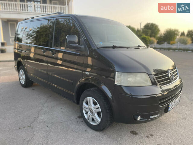 Черный Фольксваген Мультиван, объемом двигателя 2.5 л и пробегом 355 тыс. км за 9500 $, фото 5 на Automoto.ua