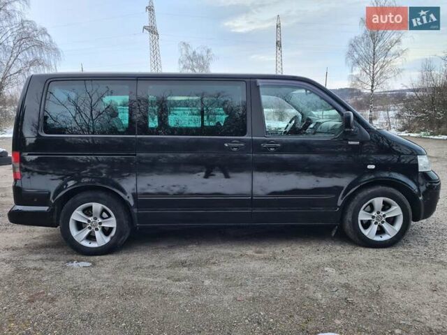 Чорний Фольксваген Мультиван, об'ємом двигуна 2.5 л та пробігом 256 тис. км за 9900 $, фото 4 на Automoto.ua