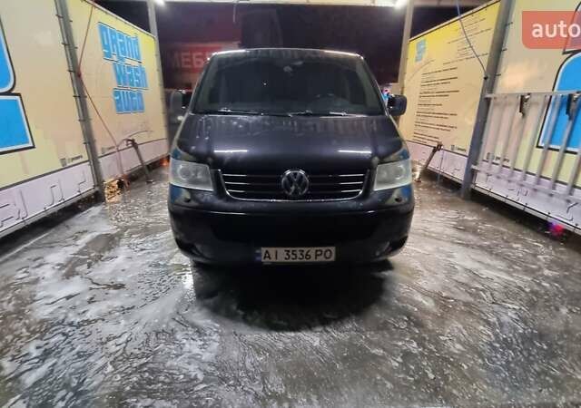 Чорний Фольксваген Мультиван, об'ємом двигуна 2.5 л та пробігом 290 тис. км за 13500 $, фото 1 на Automoto.ua