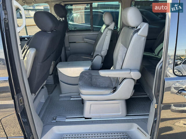 Фольксваген Мультиван 2007 в Киеве на Automoto.ua Черный Фольксваген Мультиван, объемом двигателя 2.5 л и пробегом 361 тыс. км за 12790 $, фото 26 на Automoto.ua