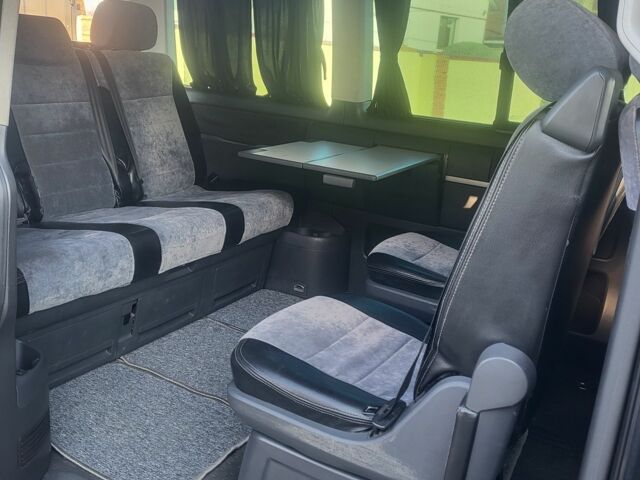 Черный Фольксваген Мультиван, объемом двигателя 2.5 л и пробегом 428 тыс. км за 10700 $, фото 11 на Automoto.ua