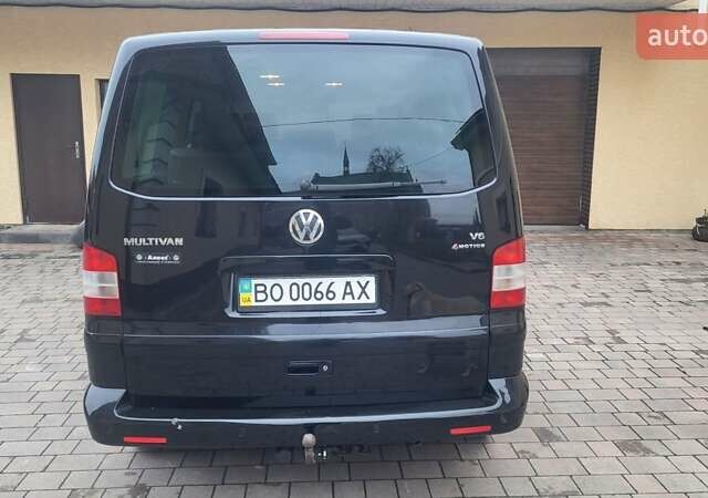 Черный Фольксваген Мультиван, объемом двигателя 3.2 л и пробегом 325 тыс. км за 12000 $, фото 3 на Automoto.ua