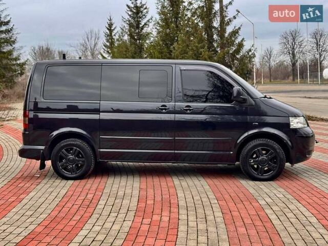 Черный Фольксваген Мультиван, объемом двигателя 2.46 л и пробегом 400 тыс. км за 18500 $, фото 3 на Automoto.ua
