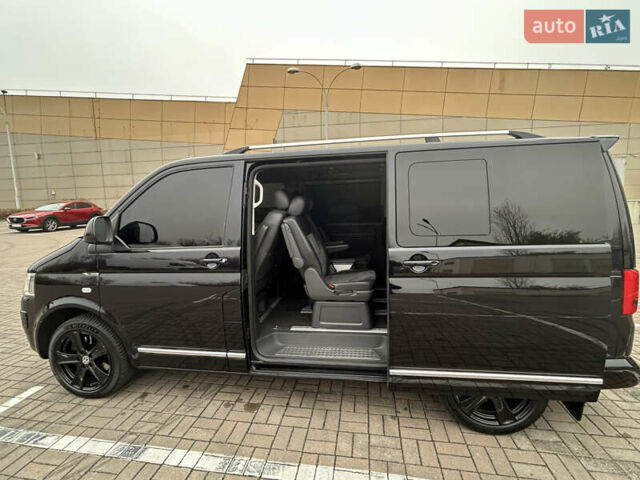 Черный Фольксваген Мультиван, объемом двигателя 1.97 л и пробегом 300 тыс. км за 25000 $, фото 28 на Automoto.ua