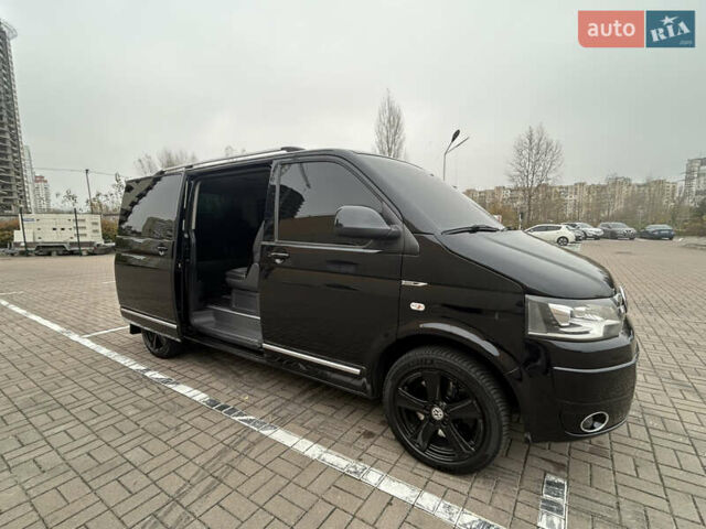 Черный Фольксваген Мультиван, объемом двигателя 1.97 л и пробегом 300 тыс. км за 25000 $, фото 31 на Automoto.ua