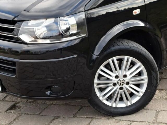 Черный Фольксваген Мультиван, объемом двигателя 2 л и пробегом 195 тыс. км за 9400 $, фото 3 на Automoto.ua