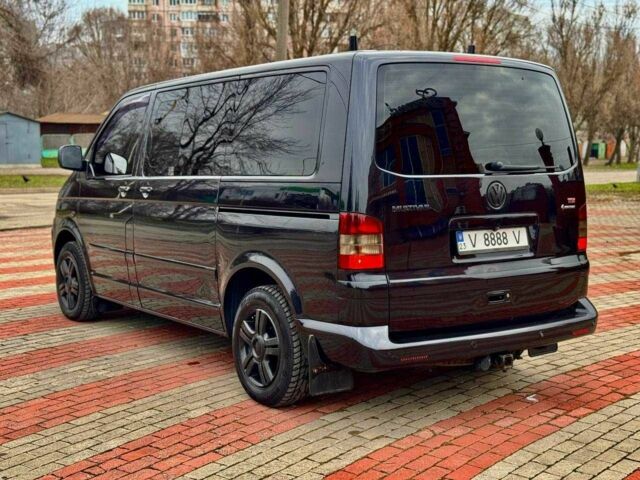 Черный Фольксваген Мультиван, объемом двигателя 2.5 л и пробегом 286 тыс. км за 18500 $, фото 7 на Automoto.ua