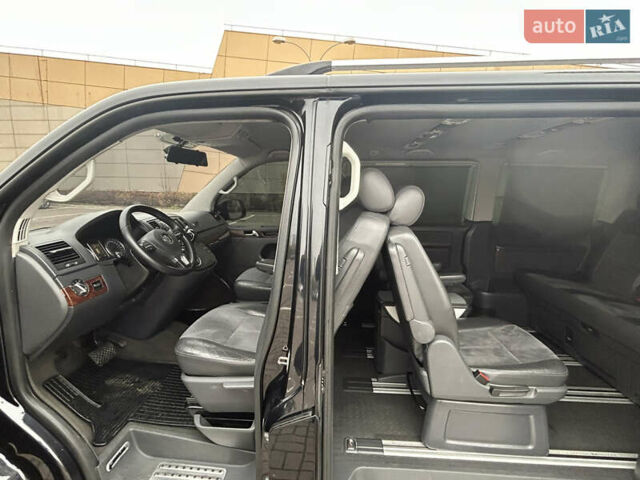 Черный Фольксваген Мультиван, объемом двигателя 1.97 л и пробегом 300 тыс. км за 25000 $, фото 34 на Automoto.ua