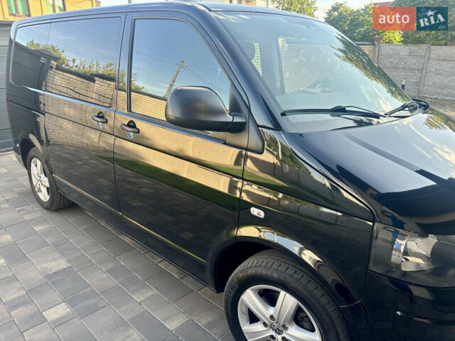 Черный Фольксваген Мультиван, объемом двигателя 2 л и пробегом 261 тыс. км за 20000 $, фото 7 на Automoto.ua
