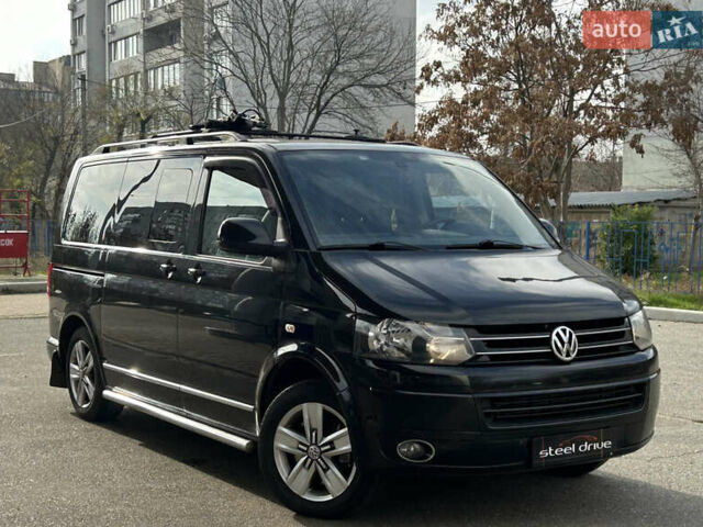 Черный Фольксваген Мультиван, объемом двигателя 2 л и пробегом 311 тыс. км за 21499 $, фото 2 на Automoto.ua