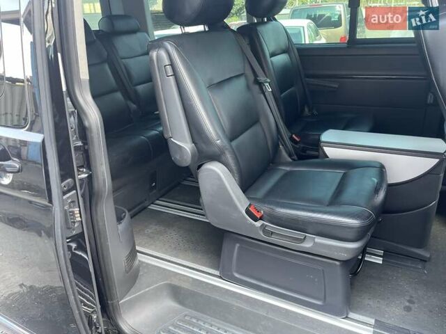 Черный Фольксваген Мультиван, объемом двигателя 2 л и пробегом 220 тыс. км за 21900 $, фото 22 на Automoto.ua