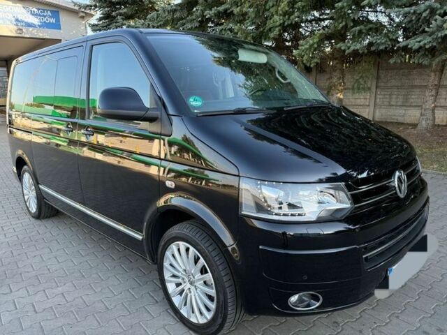 Чорний Фольксваген Мультиван, об'ємом двигуна 2 л та пробігом 117 тис. км за 9400 $, фото 1 на Automoto.ua