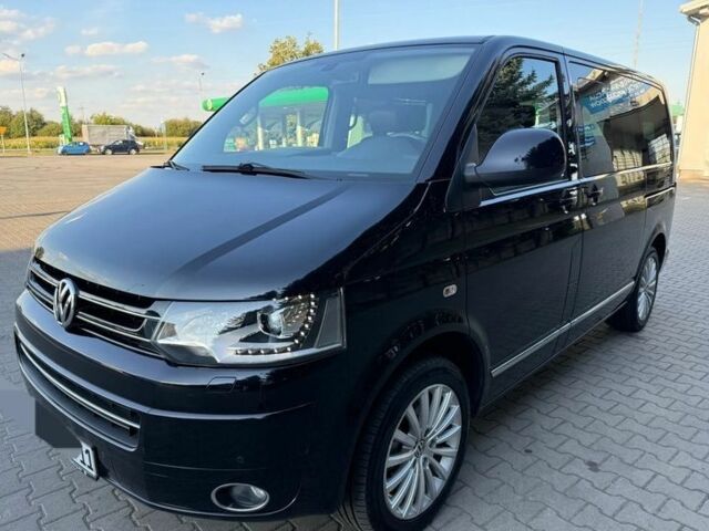 Чорний Фольксваген Мультиван, об'ємом двигуна 2 л та пробігом 117 тис. км за 9400 $, фото 2 на Automoto.ua