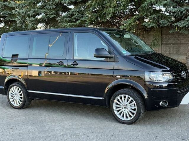 Чорний Фольксваген Мультиван, об'ємом двигуна 2 л та пробігом 117 тис. км за 9400 $, фото 5 на Automoto.ua
