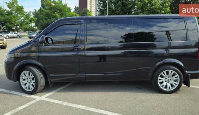 Черный Фольксваген Мультиван, объемом двигателя 1.97 л и пробегом 145 тыс. км за 30000 $, фото 19 на Automoto.ua