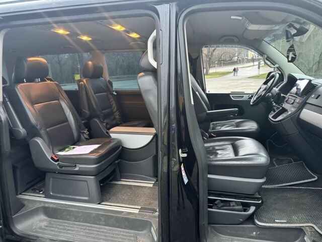 Черный Фольксваген Мультиван, объемом двигателя 2 л и пробегом 308 тыс. км за 16400 $, фото 1 на Automoto.ua