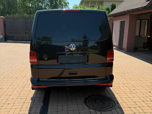 Черный Фольксваген Мультиван, объемом двигателя 2 л и пробегом 330 тыс. км за 30000 $, фото 2 на Automoto.ua