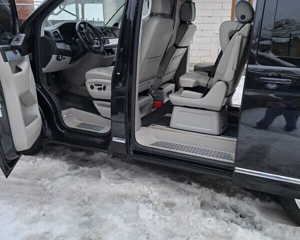 Черный Фольксваген Мультиван, объемом двигателя 2 л и пробегом 158 тыс. км за 42000 $, фото 11 на Automoto.ua