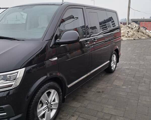 Черный Фольксваген Мультиван, объемом двигателя 2 л и пробегом 158 тыс. км за 42000 $, фото 7 на Automoto.ua