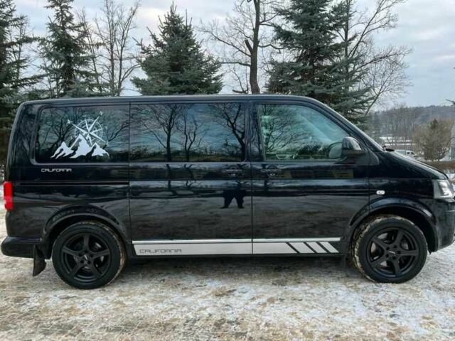 Черный Фольксваген Мультиван, объемом двигателя 2 л и пробегом 118 тыс. км за 22800 $, фото 2 на Automoto.ua