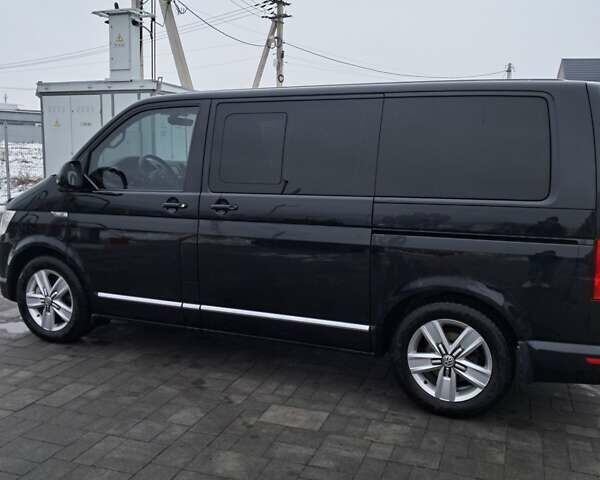 Черный Фольксваген Мультиван, объемом двигателя 2 л и пробегом 158 тыс. км за 42000 $, фото 6 на Automoto.ua