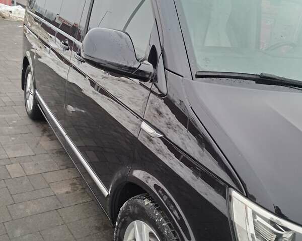 Черный Фольксваген Мультиван, объемом двигателя 2 л и пробегом 158 тыс. км за 42000 $, фото 1 на Automoto.ua