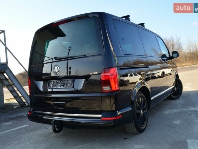 Чорний Фольксваген Мультиван, об'ємом двигуна 2 л та пробігом 216 тис. км за 41555 $, фото 30 на Automoto.ua