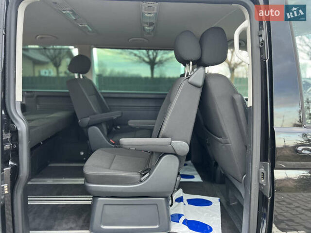 Черный Фольксваген Мультиван, объемом двигателя 2 л и пробегом 270 тыс. км за 31700 $, фото 24 на Automoto.ua