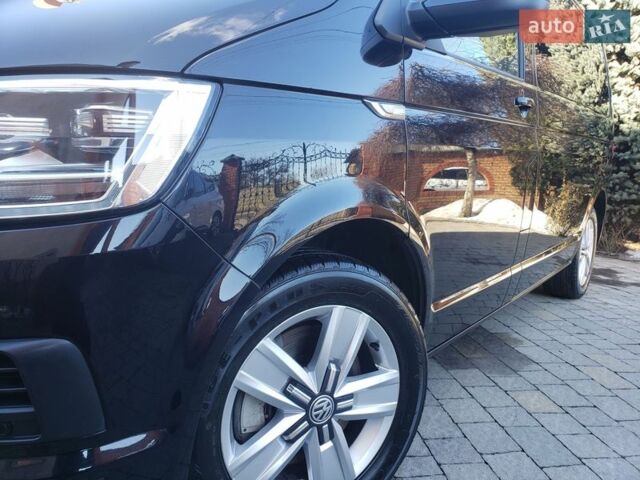 Черный Фольксваген Мультиван, объемом двигателя 2 л и пробегом 255 тыс. км за 34500 $, фото 5 на Automoto.ua