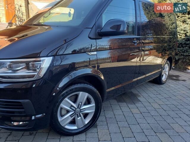 Черный Фольксваген Мультиван, объемом двигателя 2 л и пробегом 255 тыс. км за 34500 $, фото 4 на Automoto.ua
