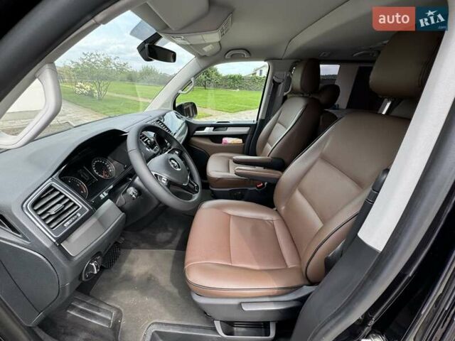 Фольксваген Мультиван 2018 в Киеве на Automoto.ua Черный Фольксваген Мультиван, объемом двигателя 1.97 л и пробегом 153 тыс. км за 36500 $, фото 9 на Automoto.ua