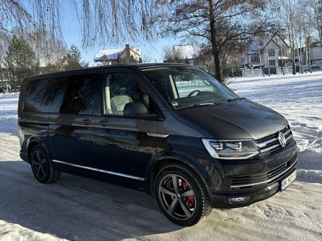 Черный Фольксваген Мультиван, объемом двигателя 2 л и пробегом 263 тыс. км за 39000 $, фото 1 на Automoto.ua