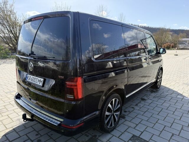 Чорний Фольксваген Мультиван, об'ємом двигуна 2 л та пробігом 175 тис. км за 43229 $, фото 1 на Automoto.ua